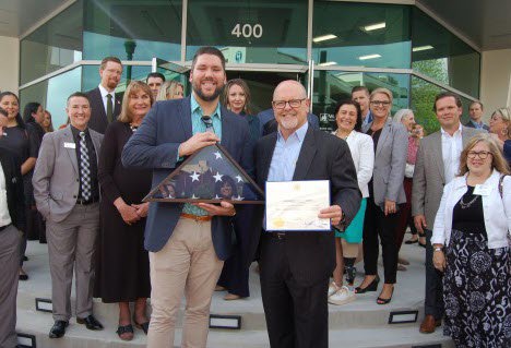 Highlighting the grand opening of the newly rebuilt Woodforest National Bank flagship location in historic downtown Conroe was the presentation of a commemorative United States flag by Craig Lewellyn (left) of Congressman Kevin Brady’s office to Jay Dreibelbis (right), President and CEO of Woodforest National Bank. Highlighting the grand opening of the newly rebuilt Woodforest National Bank flagship location in historic downtown Conroe was the presentation of a commemorative United States flag by Craig Lewellyn (left) of Congressman Kevin Brady’s office to Jay Dreibelbis (right), President and CEO of Woodforest National Bank.