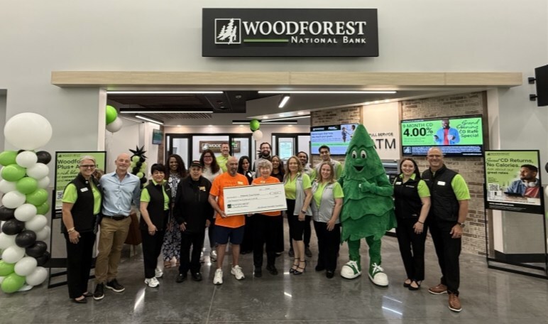 Serving their neighbors together, bankers at Woodforest National Bank were pleased to support Wildsoup Kitchen, LLC, at the opening of their new branch in The Villages, Florida, helping to strengthen the communities Woodforest serves.
